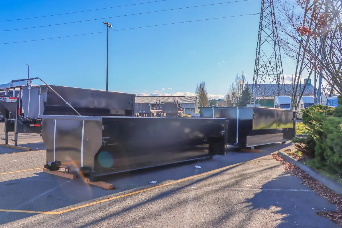 Roll-off dumpster ready for waste disposal at job site for 12 Yard Dumpster Rental in Brighton